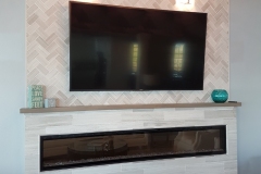 Beach Casual Villa Renovation on Longboat Key - Linear Fireplace
